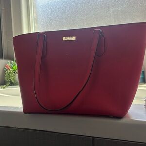 Kate Spade Purse-wear on inside. Plate is slightly scratched.
